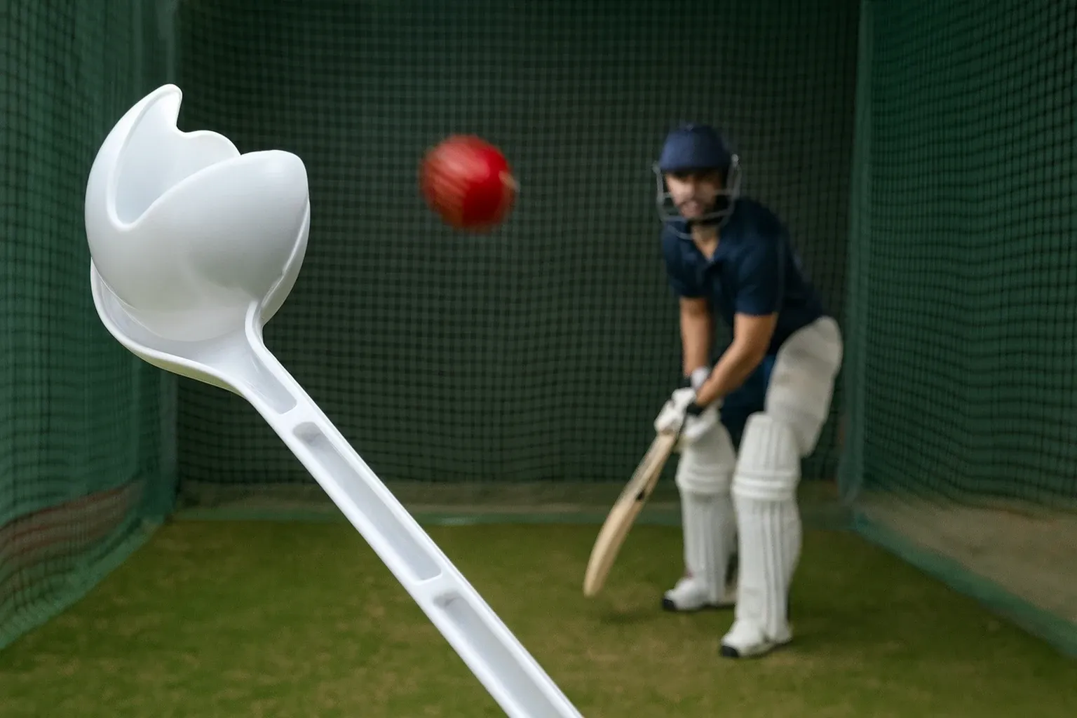 Side Arm Ball Thrower.webp